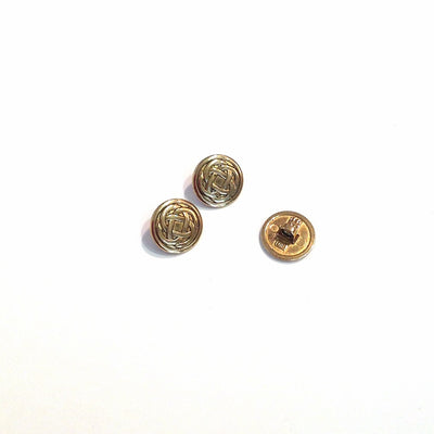 Gold-knot-embossed-button 